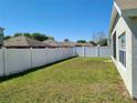 Fenced backyard with plenty of space for outdoor activities at 5598 Sw 39Th St, Ocala, FL 34474