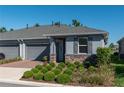 House exterior with gray siding and two-car garage at 5237 Nw 34Th St, Ocala, FL 34482