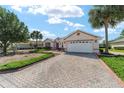 Single-Gathering home with 2-car garage and beautifully landscaped yard at 8678 Sw 83Rd Cir, Ocala, FL 34481