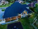 Home with a large backyard, screened porch, and fire pit at 1719 Sw 27Th Pl, Ocala, FL 34471