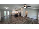 Open concept kitchen with island and stainless steel appliances at Tbd Bay Lane Loop, Ocklawaha, FL 32179