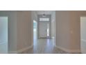 Bright and airy entryway with tile flooring and neutral walls at 5243 Sw 106Th St, Ocala, FL 34476