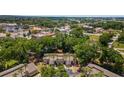 Aerial view of townhomes nestled in a wooded area at 2915 Sw 32Nd Ave # C3, Ocala, FL 34474