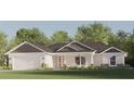 One-story home with dark roof, light-colored siding, and a nicely landscaped front yard at Tbd Guava Pass Ct, Ocklawaha, FL 32179