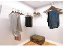 Bright walk-in closet with ample shelving and hanging space at Tbd Bay Ct, Ocklawaha, FL 32179