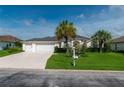Single story home with a two car garage and mature landscaping at 2260 Nw 51St Ter, Ocala, FL 34482