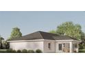 Rear view of a house showcasing a covered patio and lush landscaping at Tbd Magnolia Place Dr, Ocklawaha, FL 32179