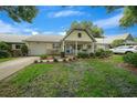 House exterior showcasing a charming facade and neat lawn at 8841 Sw 91St St # D, Ocala, FL 34481