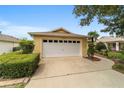House exterior showcasing garage and driveway at 9372 Sw 90Th St, Ocala, FL 34481