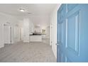 Bright and airy entryway leading to the living areas and kitchen at 24449 Nw Falcon Ave, Dunnellon, FL 34431