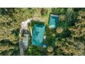 Aerial view of a property with multiple buildings at 7679 S Magnolia Ave, Ocala, FL 34476