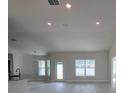 Spacious living room with high ceilings and tile flooring at 5838 Sw 82Nd Ln, Ocala, FL 34476