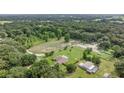 Aerial view of house and large surrounding land at 13783 Se 8Th Ct, Ocala, FL 34480