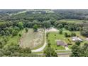 Aerial view of property, including outbuildings at 13783 Se 8Th Ct, Ocala, FL 34480