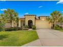 Two-story house with attached garage and well manicured lawn at 9793 Sw 63Rd Loop, Ocala, FL 34481