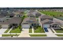 Aerial view of a quiet residential neighborhood with numerous homes at 7288 Sw 64Th Street Rd, Ocala, FL 34474