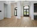 Large living room with high ceilings and hardwood floors at 7578 Nw 33Rd Pl, Ocala, FL 34482