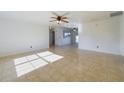 Spacious living room with tile floors and lots of natural light at 16361 Se 87Th Ave, Summerfield, FL 34491