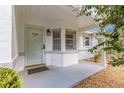 Inviting front door entrance with light-colored walls at 9460 Sw 84Th Ter # D, Ocala, FL 34481