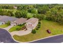 Aerial view of a house and surrounding golf course at 3 Diamond Ridge Way, Ocala, FL 34472