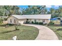 Aerial view showing single Gathering home and landscaping at 6340 Se 127Th Pl, Belleview, FL 34420