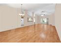 Spacious living room featuring hardwood floors and lots of natural light at 16369 Sw 14Th Avenue Rd, Ocala, FL 34473