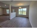 Bright dining room with tile flooring and large window at 8400 Sw 57Th Ct, Ocala, FL 34476