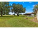 Home with large backyard, mature trees, and barn at 1000 Se 155Th St, Summerfield, FL 34491