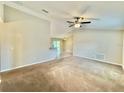 Spacious living room with carpeted floors and neutral walls at 16331 Sw 37Th Terrace Rd, Ocala, FL 34473