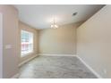 Spacious dining area with tile flooring and natural light at 4519 Sw 111Th Pl, Ocala, FL 34476