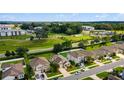 Aerial view of a residential neighborhood with various houses and green spaces at 5325 Sw 49Th Ave, Ocala, FL 34474