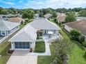 Single story home with driveway and nicely landscaped yard at 7174 Sw 113Th Loop, Ocala, FL 34476