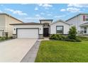 One-story home with two car garage and landscaping at 5375 Sw 40Th Cir, Ocala, FL 34474