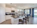 Modern kitchen with granite countertops and stainless steel appliances at 9321 Sw 60Th Court Rd, Ocala, FL 34476