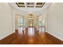 Spacious entryway with hardwood floors, high ceilings and columns at 8280 Se 15Th Ct, Ocala, FL 34480