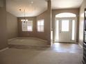 Bright entryway with tile flooring and high ceilings at 11890 Sw 137Th Loop, Dunnellon, FL 34432