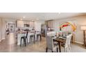 Open concept kitchen with island, granite countertops, and stainless steel appliances at 4758 Sw 88Th St, Ocala, FL 34476