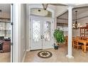 Bright entryway with tile flooring and view of dining area at 6925 Se 96Th Place Rd, Belleview, FL 34420