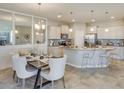 Modern kitchen with island and stainless steel appliances at 4737 Nw 39Th Street Rd, Ocala, FL 34482