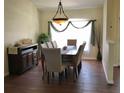 Formal dining room with wood floors and chandelier at 4570 Nw 6Th Cir, Ocala, FL 34475