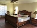 Spacious bedroom with hardwood floors and large windows at 4570 Nw 6Th Cir, Ocala, FL 34475