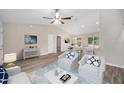 Bright and airy living room with vaulted ceilings and neutral decor at 20113 Sw 84Th St, Dunnellon, FL 34431