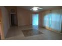 Living room with tile floors and neutral walls at 15084 Sw 28Th Terrace Rd, Ocala, FL 34473