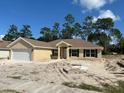 Newly constructed single-Gathering home with two-car garage at 6925 Sw 179Th Court Rd, Dunnellon, FL 34432