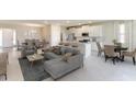 Spacious living room with open floor plan, and adjacent dining area at 9317 Sw 60Th Court Rd, Ocala, FL 34476