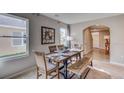 Farmhouse style dining area with rustic wooden table at 8719 Sw 44Th Ter, Ocala, FL 34476