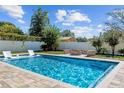 Spacious pool and patio perfect for relaxation at 740 Nw 66Th Pl, Ocala, FL 34475