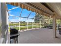 Spacious screened porch overlooking a pond at 1960 Nw 50Th Cir, Ocala, FL 34482