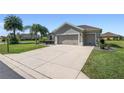 One-story home with two-car garage at 11703 Se 91St Cir, Summerfield, FL 34491