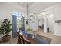 Bright dining room featuring a rustic wooden table at 3993 Se 10Th Ave, Ocala, FL 34480